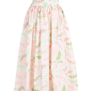 Falda con vuelo en bordado suizo blanco con estampado de hojas en tonos rosa, verde y beige, modelo Sister Laura de The Curiousers